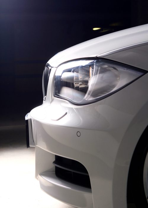 white car on black background